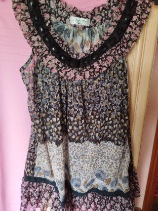 Conjunto pantalón rosa campana y blusa