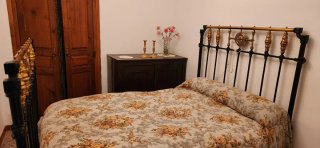 Cama antigua estrella nacarada