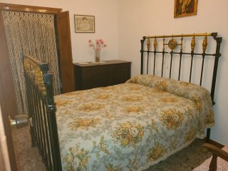 Cama antigua estrella nacarada