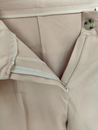 Pantalón de pinzas rosa