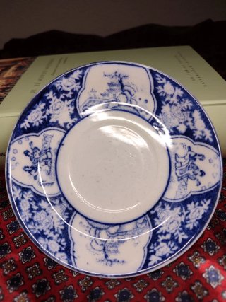 Taza y plato de té antiguos loza azul y blanca