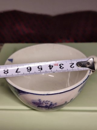 Taza y plato de té antiguos loza azul y blanca
