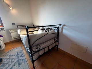 Diván cama forja y tela