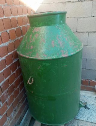 Zafra metálica antigua para aceite