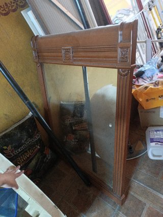 Espejo grande de madera y cristal