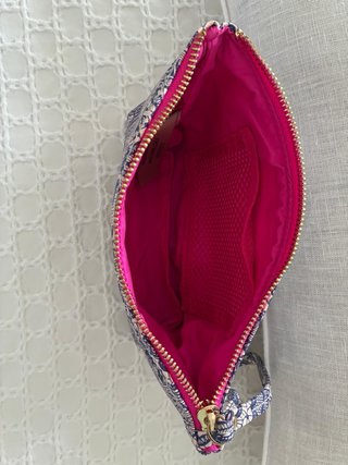 Neceser o cartera de mano con estampado floral