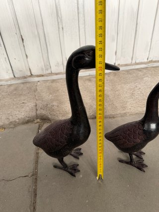 Pareja de patos decorativos de metal