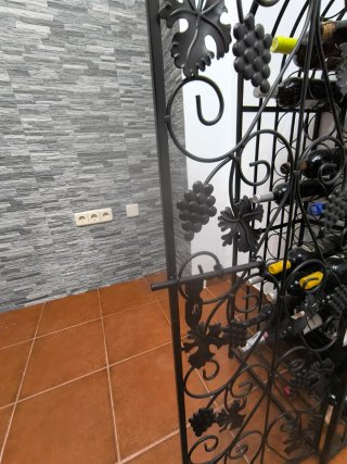 Portabottiglie in ferro battuto nero per 45 bottiglie