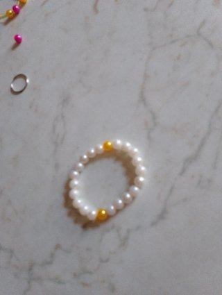 Bracciale per bambina perle bianche e oro