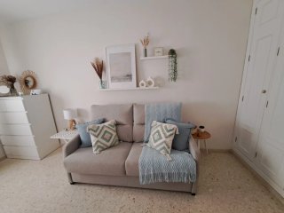 Sofá-cama 2 plazas grisáceo