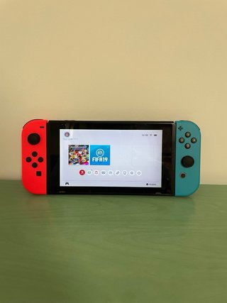 Pack Nintendo Switch + Mario Kart 8 + Extras