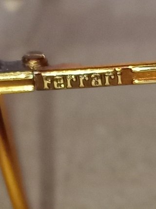 Gafas Ferrari Doradas