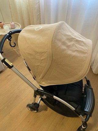 Carro Bugaboo Bee con dos capotas (rosa y beige)