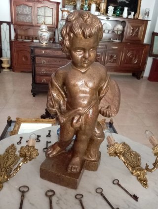 Figura de niño antiguo de talla dorado