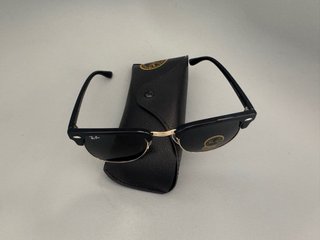 Gafas de sol Ray-Ban Clubmaster negras y doradas