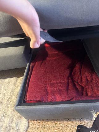 Sofá cama gris de tela