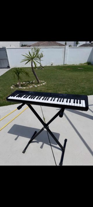 Teclado Alesis Melody 61 soporte  banqueta auricul