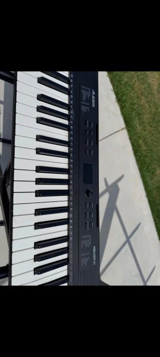 Teclado Alesis Melody 61 soporte  banqueta auricul