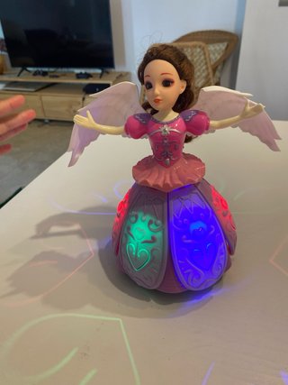 Muñeca con música y luz