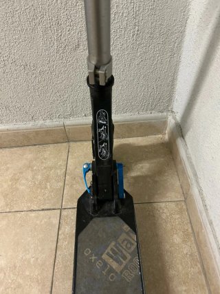 Patinete Oxelo azul y plateado