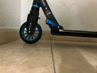 Patinete Oxelo azul y plateado