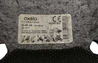 Casco bici negro Oxelo con salpicaduras doradas