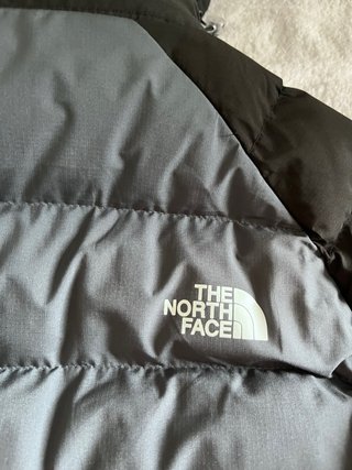 Cazadora The North Face gris y negra