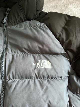 Cazadora The North Face gris y negra