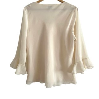 Blusa crema volantes manga campana