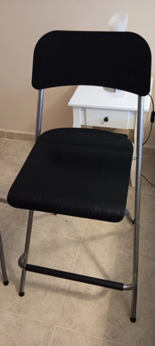 Taburetes altos plegables Ikea negros