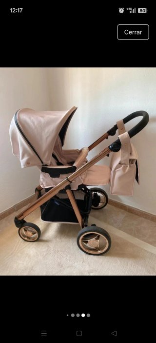 Carro de bebé rosa