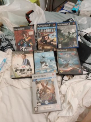Playstation 2 Negra con mando y juegos
