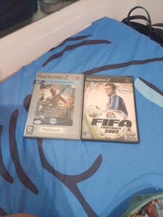 Playstation 2 Negra con mando y juegos