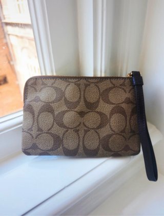 Coach Cartera de mano beige, negro y marrón.