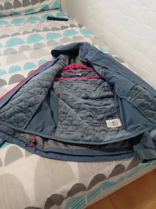 Chaqueta Quechua azul y gris de niños talla 10