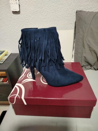 Botas de tacón con flecos de ante