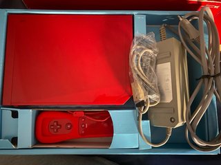 Consola Nintendo Wii Roja + dos mandos