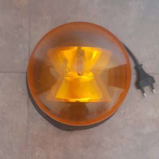 Lámpara rotativa naranja para fiestas