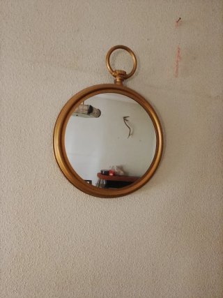 Espejo decorativo forma reloj dorado