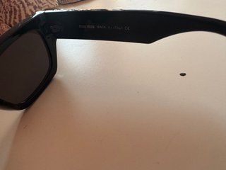 Gafas de sol Miu Miu negras y plateadas