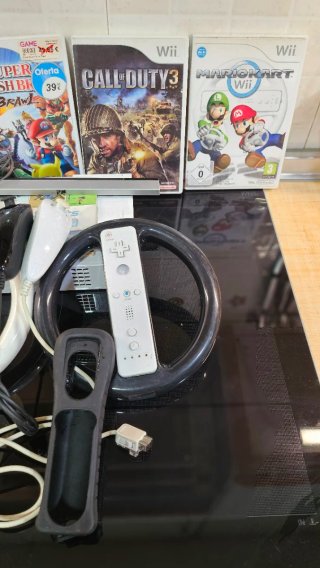 Nintendo Wii + Accesorios y Juegos