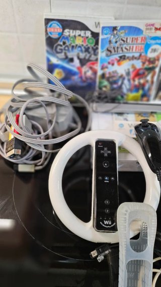 Nintendo Wii + Accesorios y Juegos