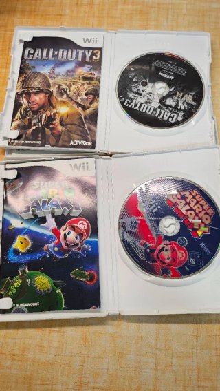 Nintendo Wii + Accesorios y Juegos