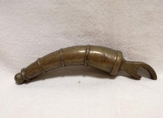 Abrebotellas antiguo bronce latón decorado