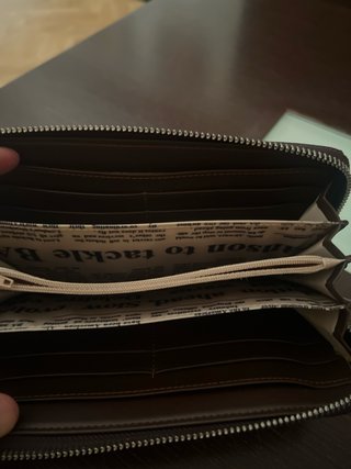 Cartera de mano piel estampado cebra Deckas