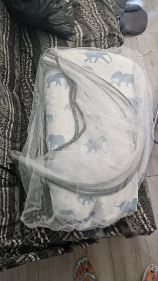 Cuna de viaje con estampado infantil