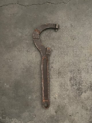 Llave gancho articulada ajustable