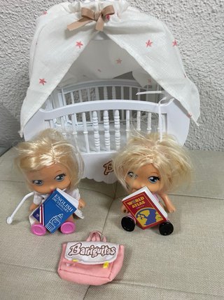 Barriguitas con estrellas i luz en la cama
