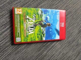 Nintendo Switch 2 + Zelda+ mando pro+funda+ protec