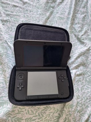 Consola +Funda Nintendo 3DS XL Luigi Con juegos